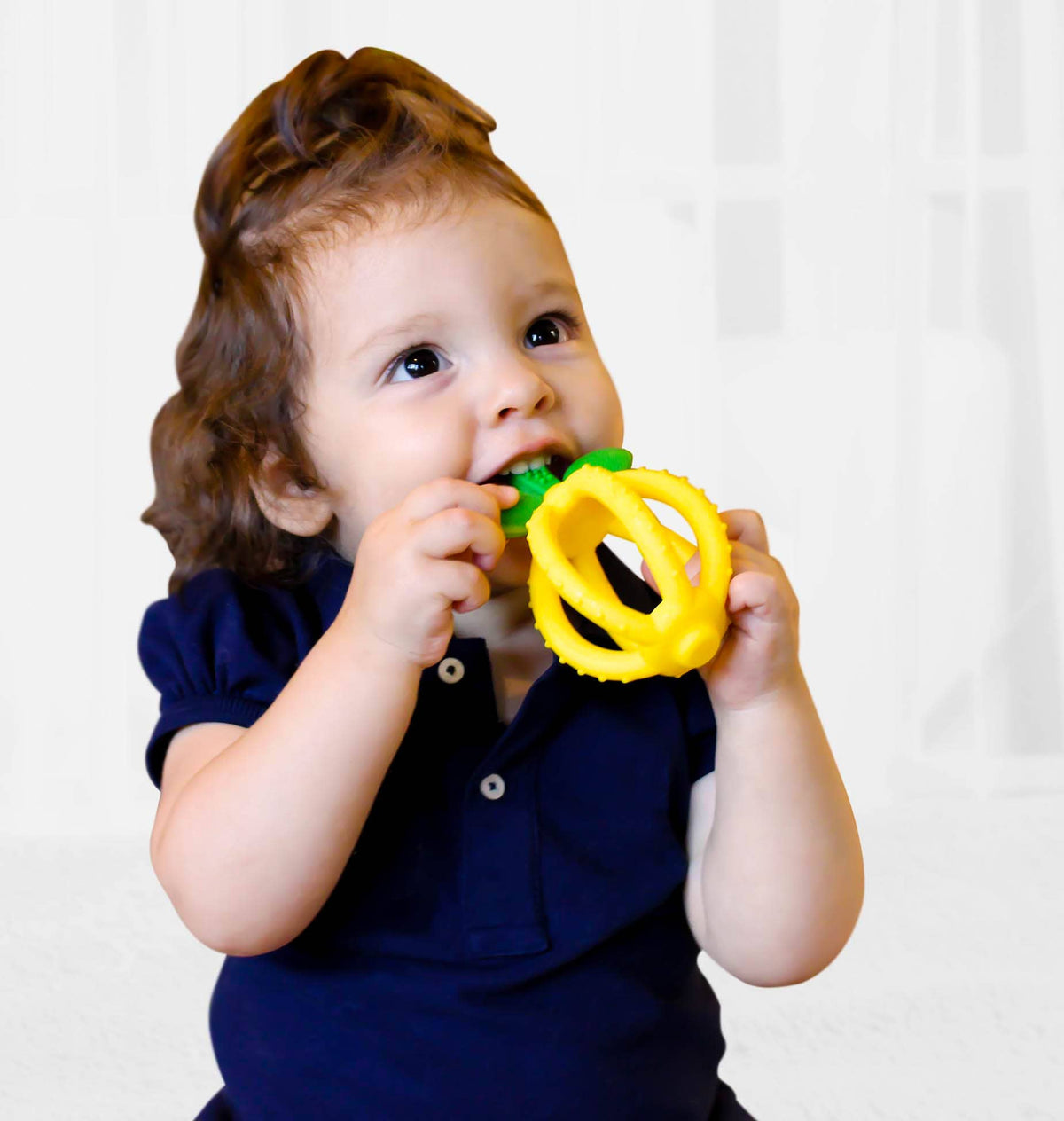 Bitzy Biter™ Teething Ball Baby Teether: Pink Lemonade